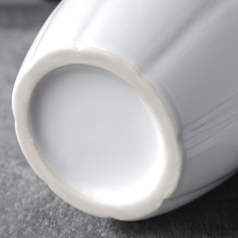 Kopp design med ultra-original pistolhåndtak 